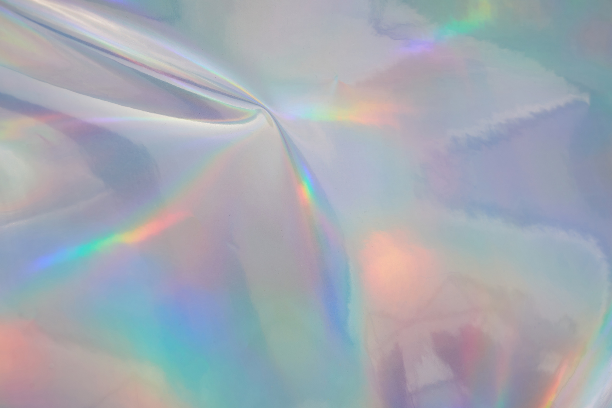Rainbow Halographic Wrinkled Foil Background. 